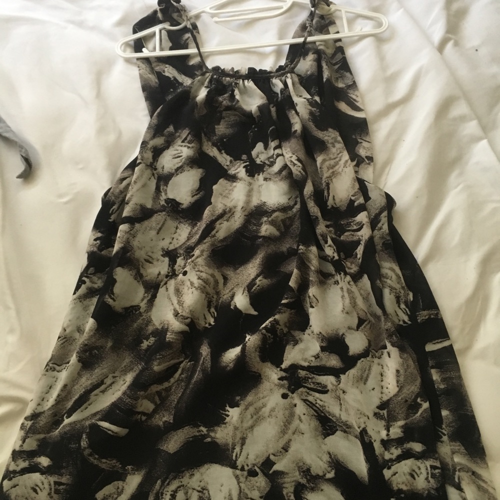Angel’s floral black mini dress empty back